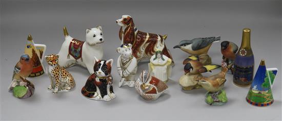 A collection of Royal Worcester birds and snuffers